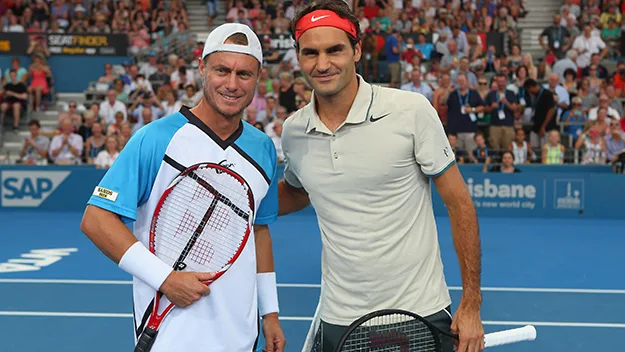 Lleyton Hewitt and Rodger Federer post-match.