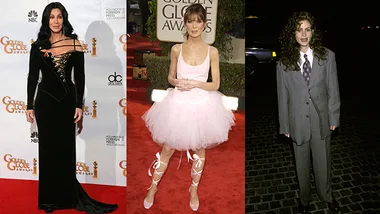 Three individuals at the Golden Globes: one in a black gown, one in a pink tutu, and one in a gray suit.