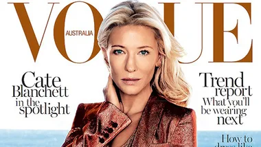 Cate Blanchett on Vogue Australia cover, wearing a shimmering rose-gold blazer, looking directly at the camera.