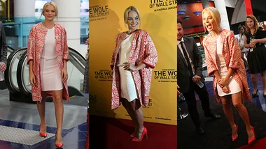 Margot Robbie in a patterned red coat and white dress, promoting "The Wolf of Wall Street" at multiple events.