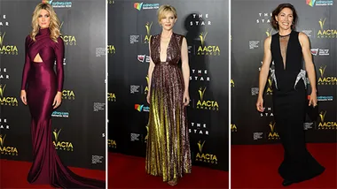 Three women in elegant gowns pose on the red carpet at the AACTA Awards.
