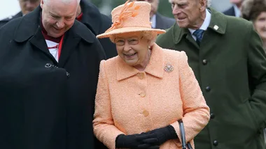 Queen Elizabeth II peach dress and hat 