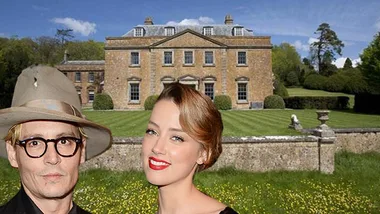 Alt text: "Two individuals in front of a large country house with a garden and trees."
