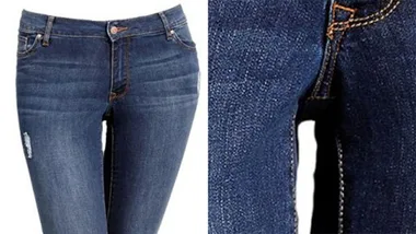 Blue plus-sized jeans with a thigh gap photoshopped in, shown with a close-up of the altered thigh area.