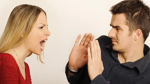 Woman yelling at man