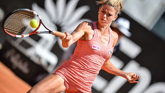 Italian tennis ace Camila Giorgi sports her sponsor's branding across her chest.
