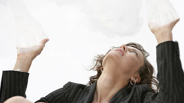 Women holding up glass ceiling