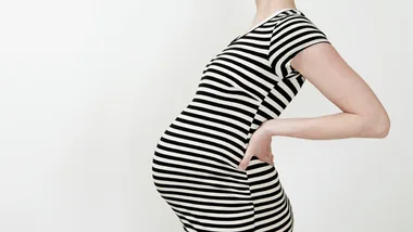 pregnant woman in striped dress