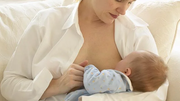 Mother breastfeeding baby