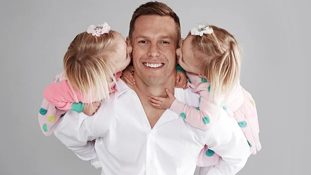 Sam Mitchell and daughters