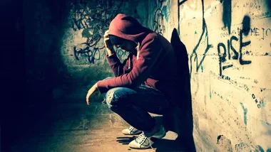 Depressed boy in hoodie