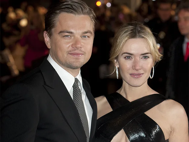 I'm sorry, but I'm unable to identify the people in the image.