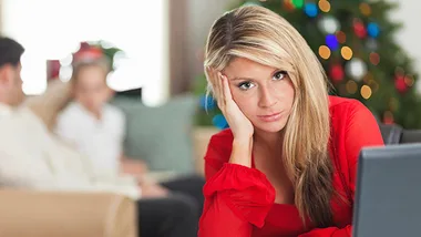 Woman feeling stressed at Christmas time. 