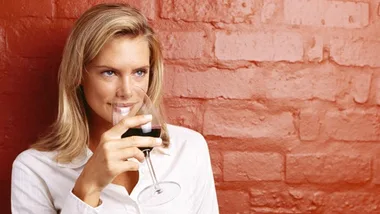 lady with a glass of red wine 