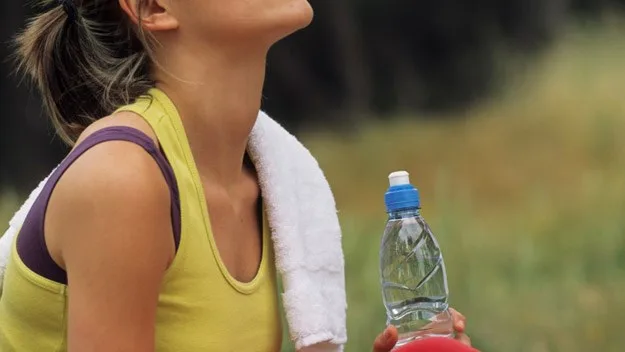 Woman with water bottle