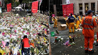 Flowers in Martin Place being clear away on Tuesday.