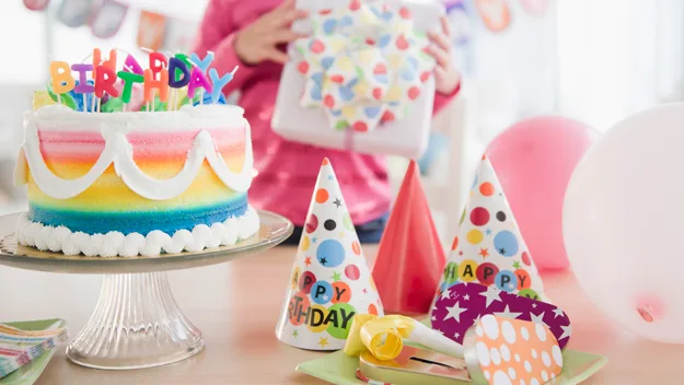 Birthday cake among other expensive party favours.