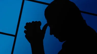 Sad man with blue background