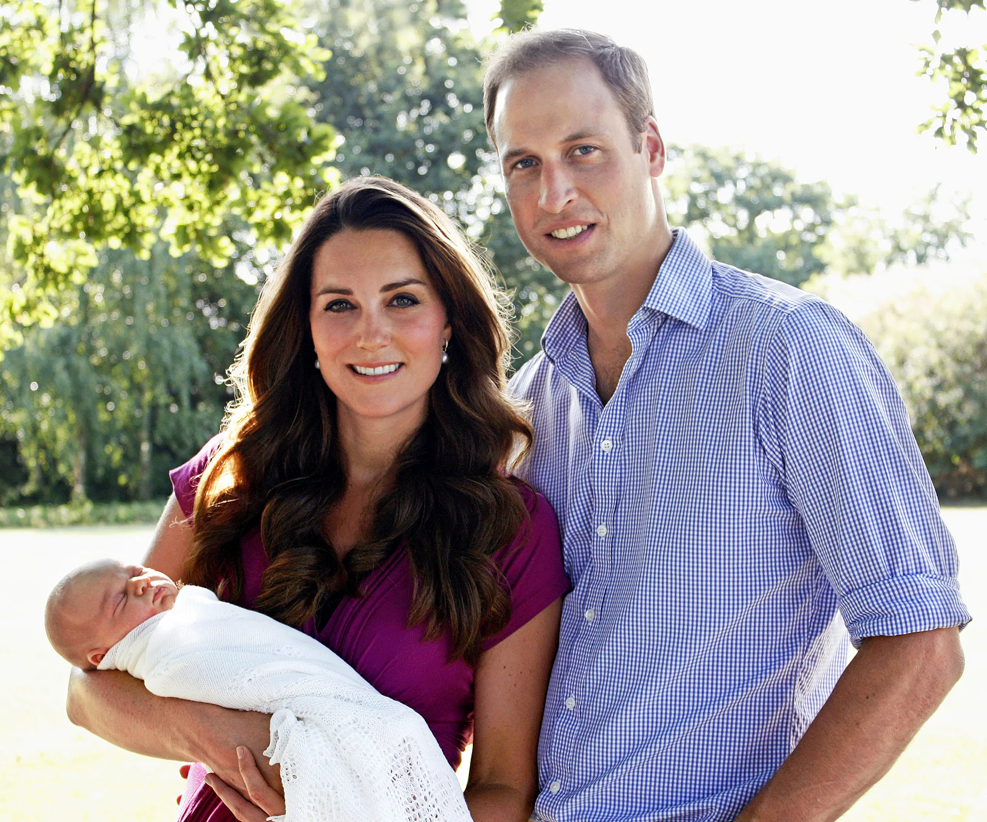 Prince George of Cambridge with Kate Middleton and Prince William