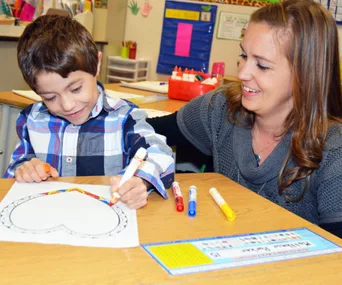 Teacher Lindsay Painter with student Matthew Parker. 