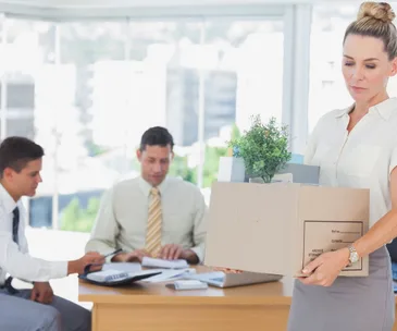 Woman being fired by men 