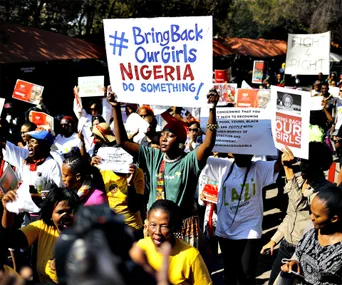 Protesters holding signs for the "Bring Back Our Girls" campaign during a demonstration in Nigeria.