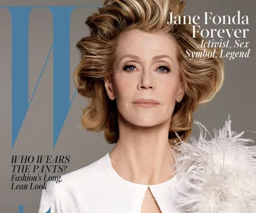 Portrait of a woman with styled hair and a white outfit on a magazine cover, featuring the text "Jane Fonda Forever."