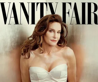 Caitlyn Jenner on Vanity Fair cover, wearing a white corset with flowing brown hair, set against a simple background.
