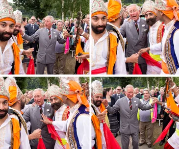 Prince Charles dancing with performers in traditional costumes at an outdoor event in Wales.