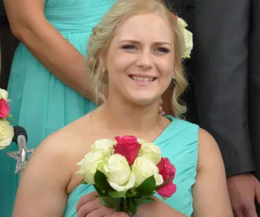 Disabled bridesmaid surprises sister by walking down the aisle