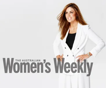 Peta Credlin in a white suit poses for Australian Women's Weekly cover.