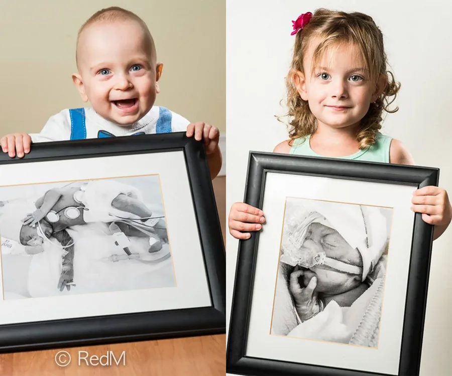 Two young children holding framed photos of themselves as premature babies in hospital settings.