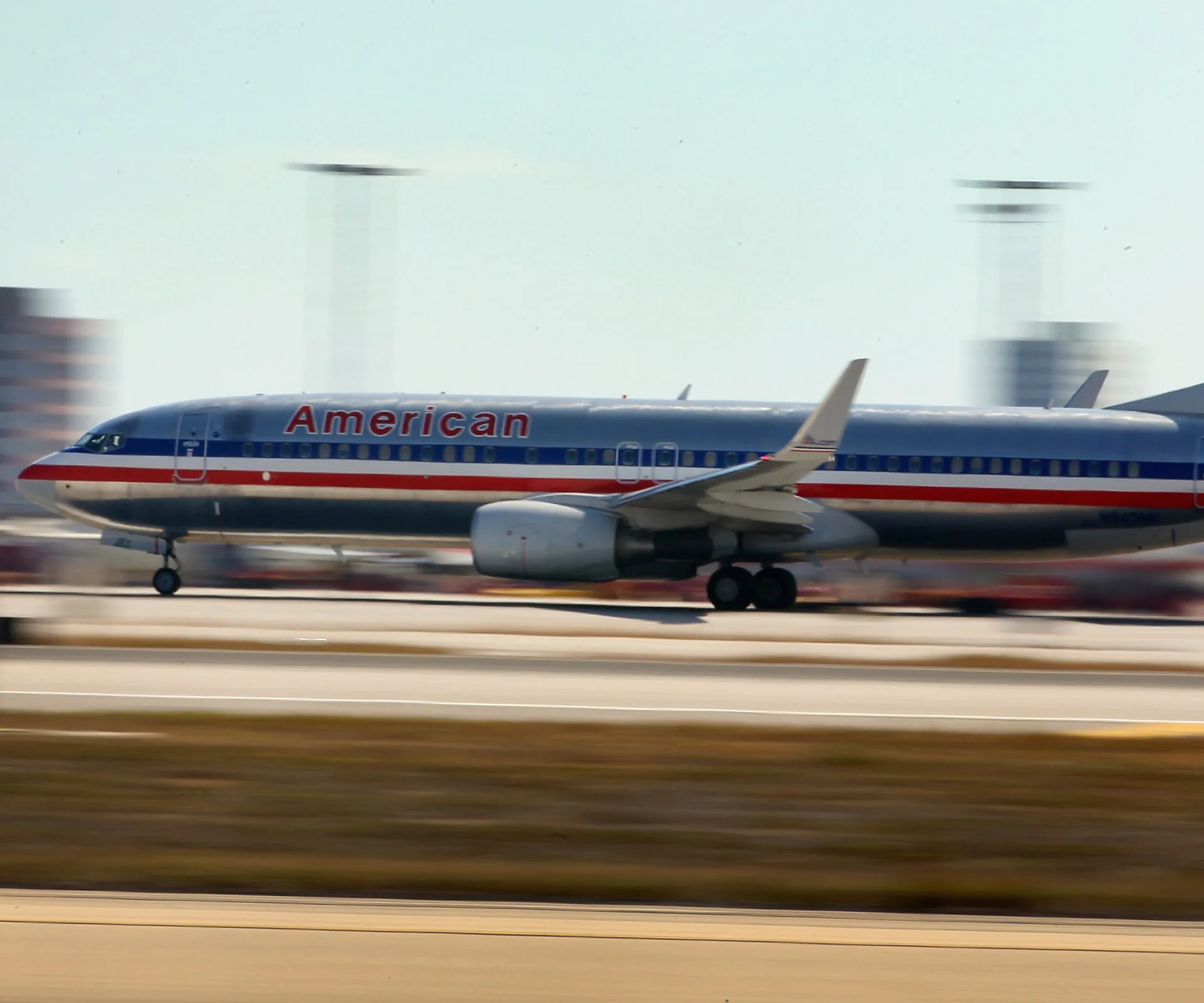 American Airlines plane taking off from a runway.