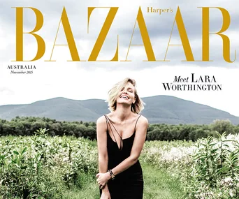 Cover of Harper's Bazaar Australia, November 2015, featuring Lara Worthington in a black dress, smiling outdoors.