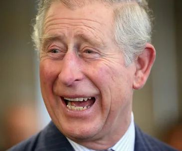 I don't know who this is, but the image shows an older man with light hair laughing or smiling broadly.
