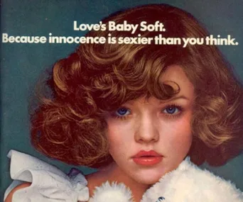 Love's Baby Soft ad featuring close-up of a young girl with curly hair, text: "Because innocence is sexier than you think."