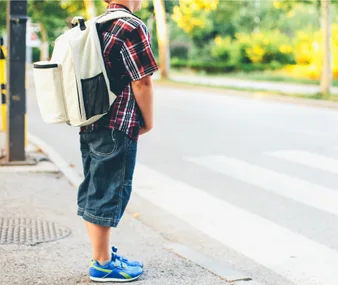 School children with backpacks 
