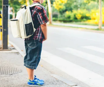 School children with backpacks 