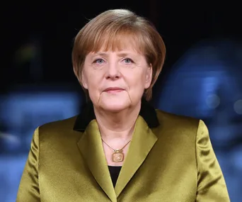 Angela Merkel wearing a green blazer, named Time's Person of the Year.