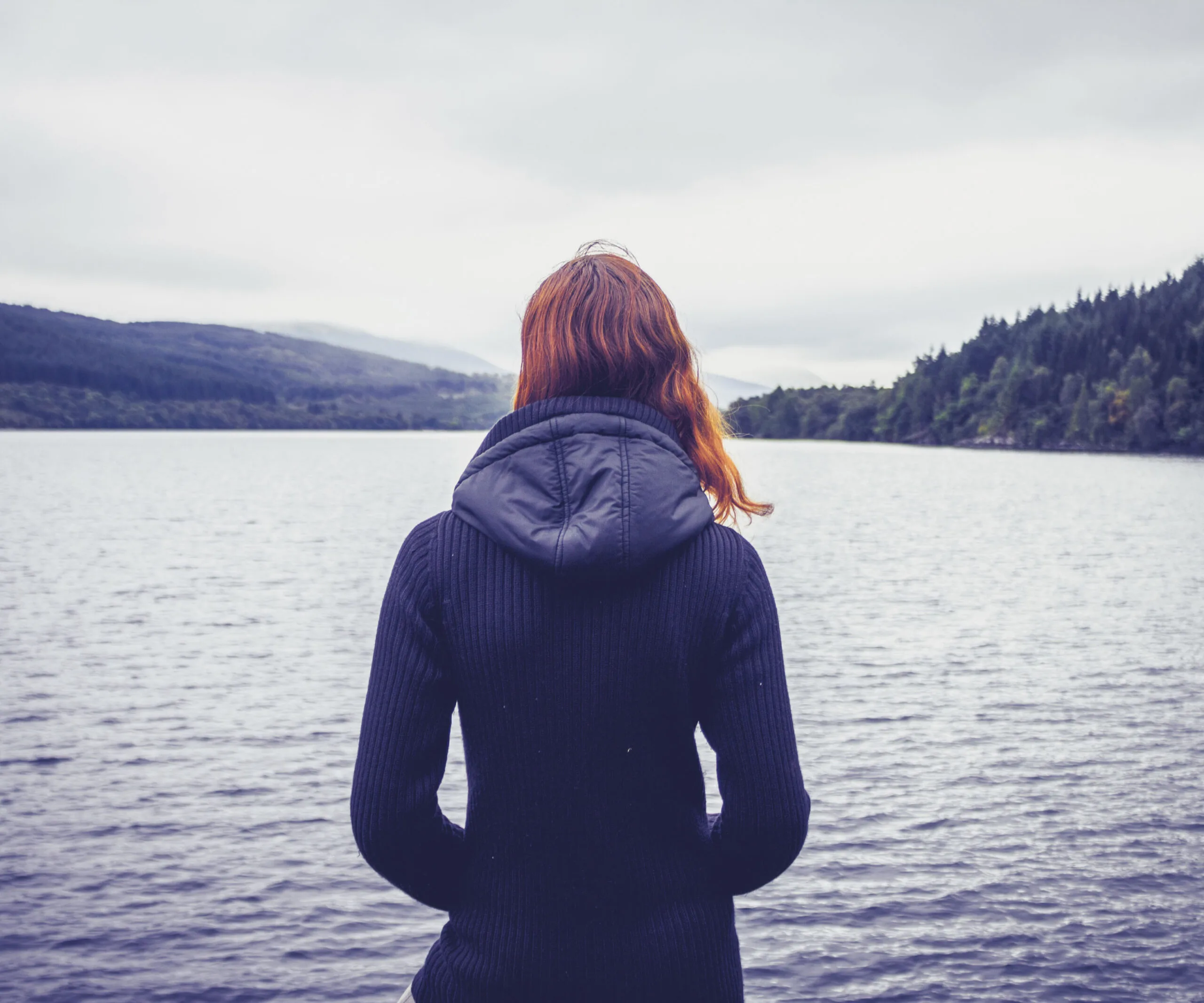 woman looks out to sea