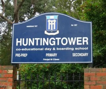 Sign for Huntingtower School, a co-educational day and boarding school, with levels from Pre-prep to Secondary.