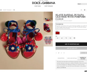 Dolce & Gabbana sandals with colorful pompoms and decorations, labeled "Slave Sandal" priced at $2,395.