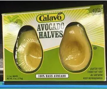 Packaged Calavo avocado halves, labeled gluten-free and all-natural, in a plastic container.