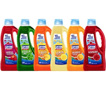 Cottee's cordial bottles in various flavors: apple raspberry, coola lime, fruit cup, lemon crush, orange crush, raspberry.