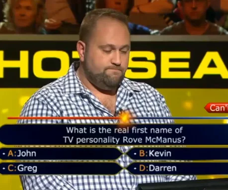 Quiz show contestant thinking, facing a question about Rove McManus's real first name, with four answer choices visible.
