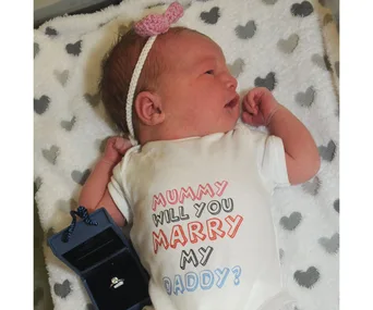 Newborn proposes to mum for dad 