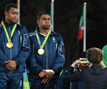 Fiji rugby team players with gold medals at the Rio Olympics 2016 ceremony.