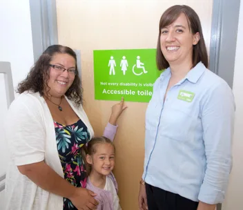 The story behind the “not all disabilities are visible” sign