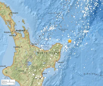 Map showing earthquake epicenter off the coast of New Zealand near North Island with surrounding seismic activity.