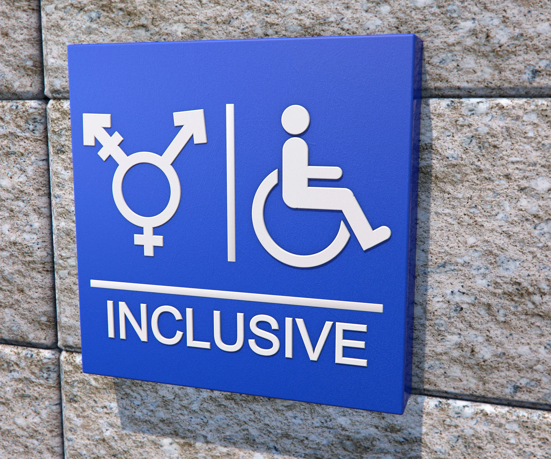 Inclusive restroom sign with gender-neutral and wheelchair symbols on a blue background.